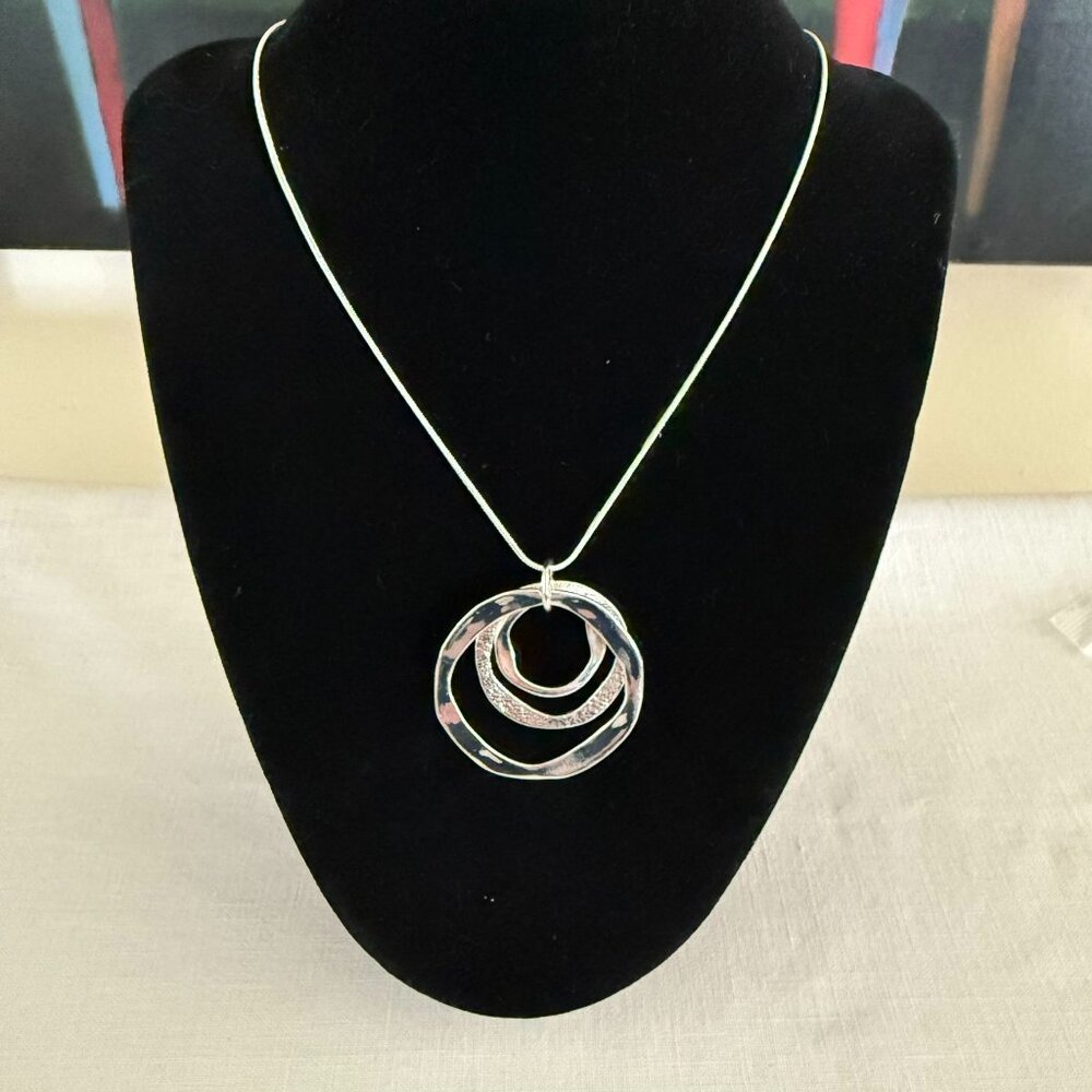 Silvertone Necklace 22-24 inches with Pendant Trio of Irregular Textured Rings